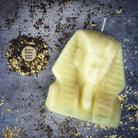 Red beeswax Egyptian King Spell Candle by Parlour of Wonders, featuring intricate hieroglyph designs for power and magnetism.