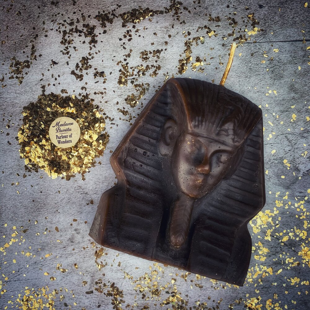 Red beeswax Egyptian King Spell Candle by Parlour of Wonders, featuring intricate hieroglyphs for power, magnetism, and pharaoh magic.