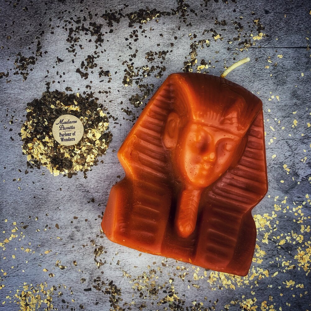 Red beeswax Egyptian King Spell Candle by Parlour of Wonders, featuring intricate hieroglyphic designs and a regal, powerful appearance.