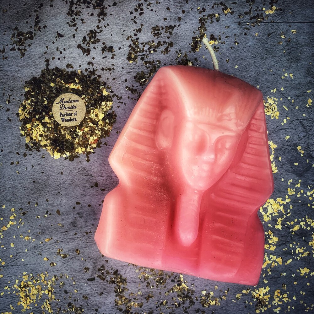Red beeswax Egyptian King Spell Candle by Parlour of Wonders, featuring intricate hieroglyphs and a regal design for power and magic.