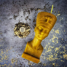 Red beeswax Egyptian Queen Spell Candle by Parlour of Wonders, featuring intricate designs symbolizing power, beauty, and magnetism.