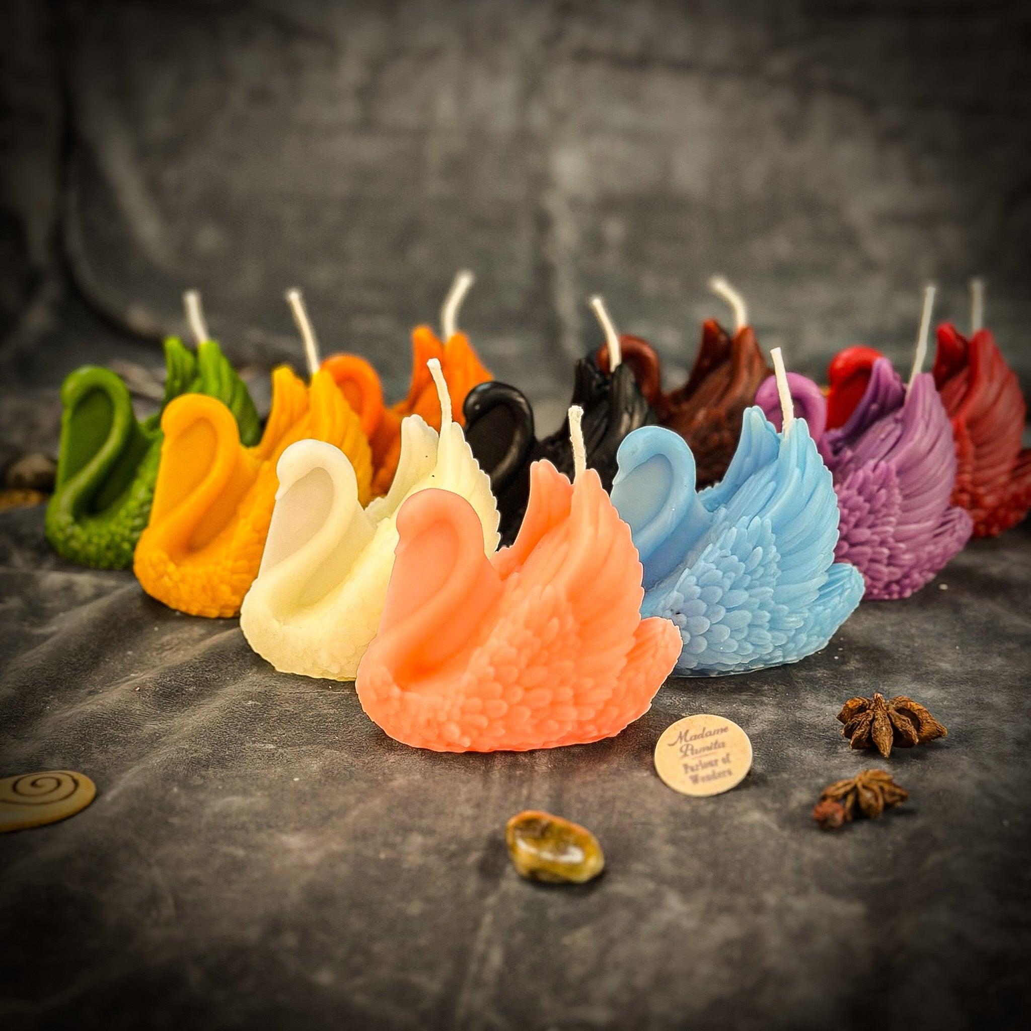Red beeswax Swan spell candle by Parlour of Wonders, featuring an elegant swan shape with detailed feathers and graceful design.