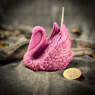 Red beeswax swan candle by Parlour of Wonders, featuring an elegant design symbolizing grace, beauty, and lasting love.