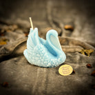 Beeswax Elegant Swan Spell Candle by Parlour of Wonders featuring a graceful swan design in rich red beeswax.