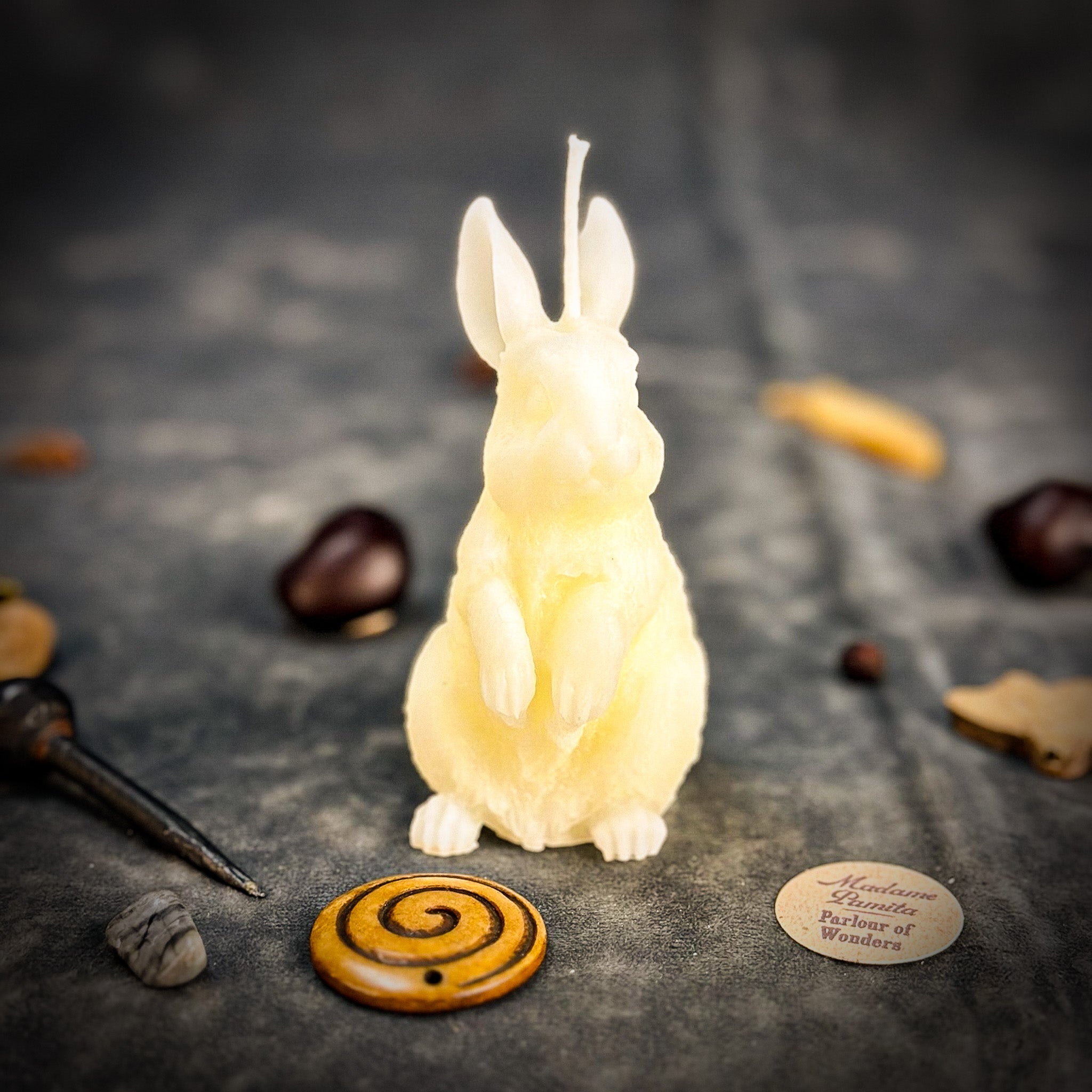 Red beeswax Enchanted Bunny Spell Candle by Parlour of Wonders for abundance, fertility, and quick thinking.