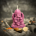Red beeswax Ganesha spell candle from Parlour of Wonders, featuring detailed Ganesha design for obstacle removal and success magic.