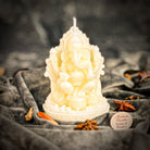 Red beeswax Ganesha spell candle for obstacle removal and success magic, designed by Parlour of Wonders.