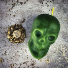 Large red beeswax skull spell candle by Parlour of Wonders, detailed with intricate designs, ideal for mind influence and ancestral magic.