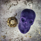 Large red beeswax skull spell candle by Parlour of Wonders, featuring detailed skull design for mind influence and ancestral magic.