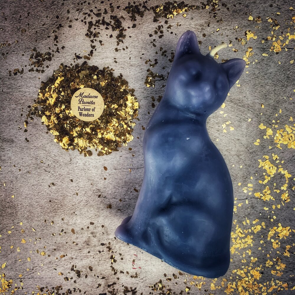 Red beeswax Lucky Cat spell candle by Parlour of Wonders, designed for fast action and manifestation magic.