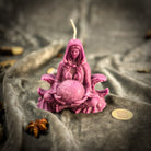 Red beeswax Moon Goddess spell candle with lunar symbols, representing divine feminine energy and lunar magic, by Parlour of Wonders.