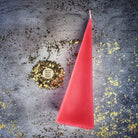 Red beeswax pyramid spell candle by Parlour of Wonders for success, stability, and magic, featuring detailed natural beeswax texture.