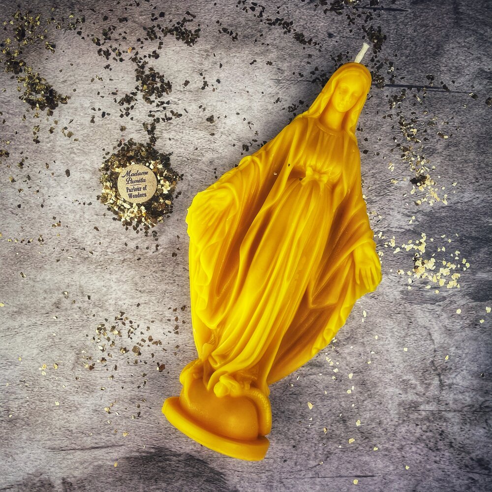 Red beeswax Queen of Heaven spell candle by Parlour of Wonders for divine protection and unconditional love magic.