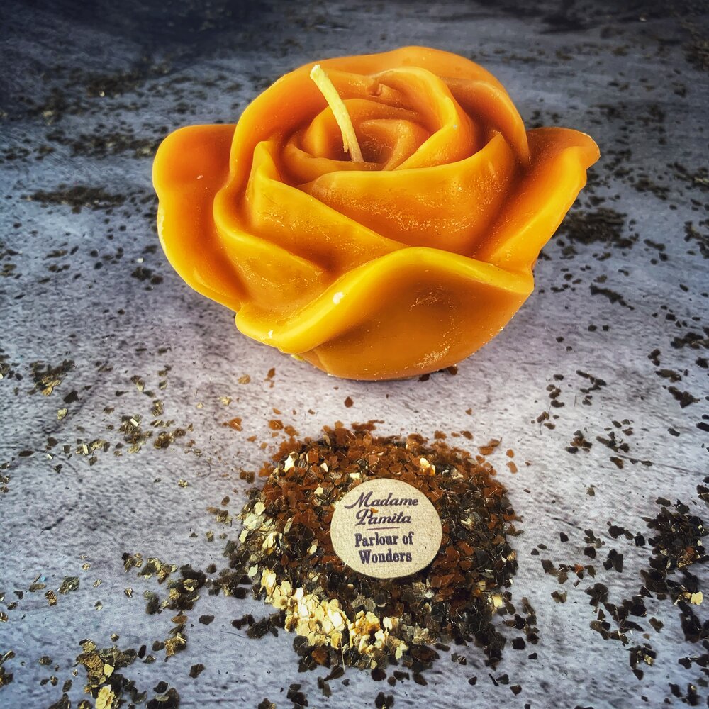 Beeswax Rose Romance Spell Candle by Parlour of Wonders, featuring a red beeswax candle with rose design for love and soulmate magic.