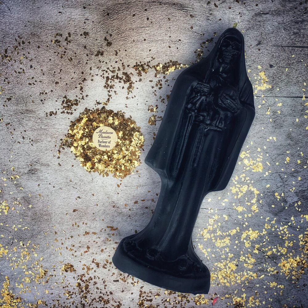 Red beeswax Santa Muerte spell candle from Parlour of Wonders for protection, devotion, and sacred folk magic.