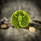 Red beeswax Scorpio zodiac spell candle featuring a scorpion design, symbolizing transformation, power, and intuition.