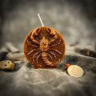 Red beeswax Scorpio zodiac spell candle featuring a scorpion design, symbolizing transformation, power, and intuition.