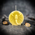Red beeswax Scorpio zodiac spell candle featuring a scorpion design, symbolizing transformation, power, and intuition.