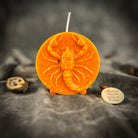 Red beeswax Scorpio zodiac spell candle with scorpion design, symbolizing transformation, power, and intuition.