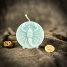 Red beeswax Scorpio zodiac spell candle with scorpion design, symbolizing transformation, power, and intuition.