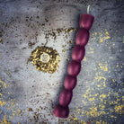 Red beeswax Seven Knob Spell Candle by Parlour of Wonders, designed for seven-day manifestation magic.