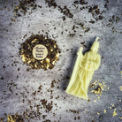 Red beeswax St. Joseph spell candle by Parlour of Wonders, used for home sale and career success magic.