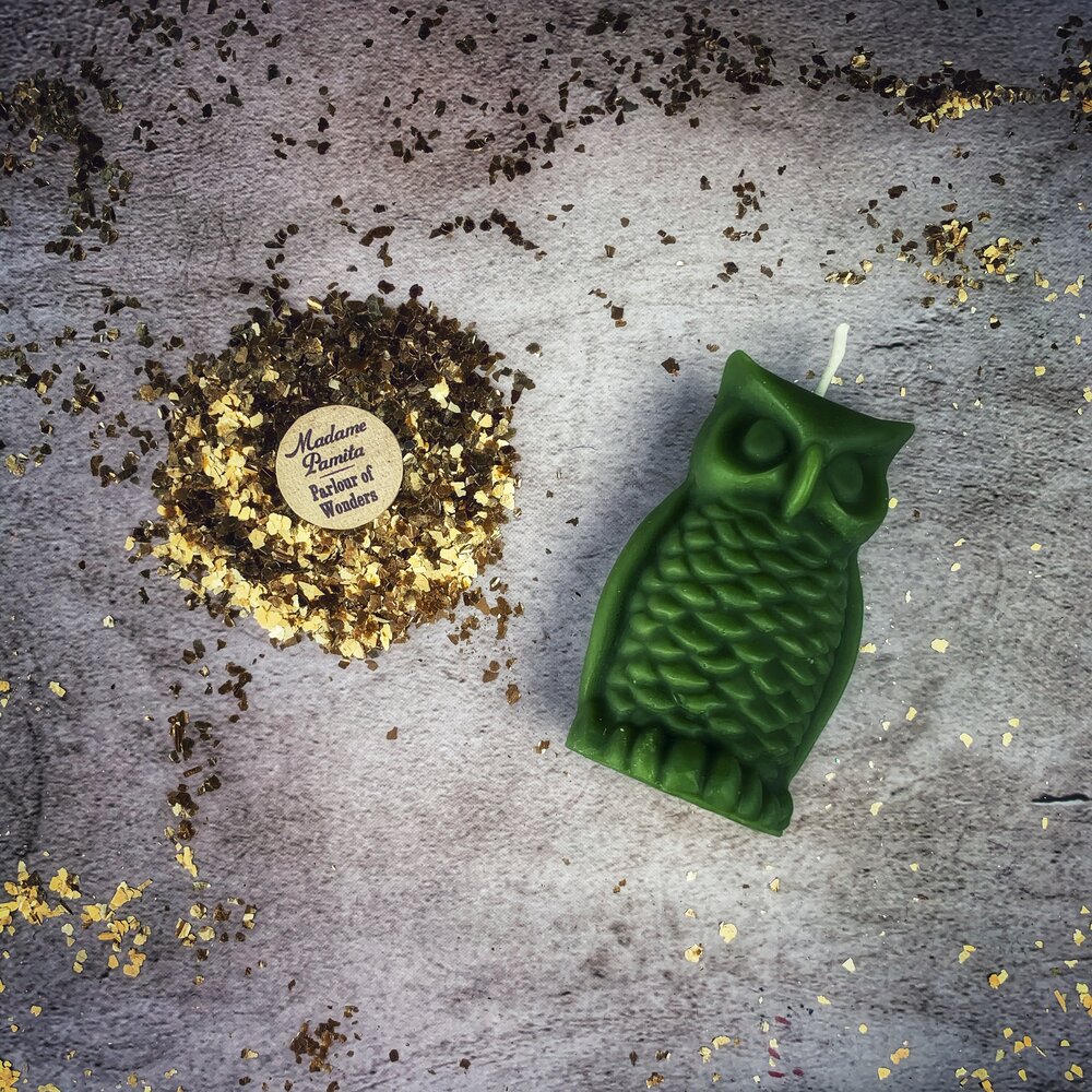 Red beeswax Wise Owl spell candle from Parlour of Wonders, featuring intricate owl design for wisdom and psychic awareness magic.
