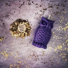 Red beeswax Wise Owl spell candle by Parlour of Wonders, featuring detailed owl design for wisdom and psychic awareness magic.