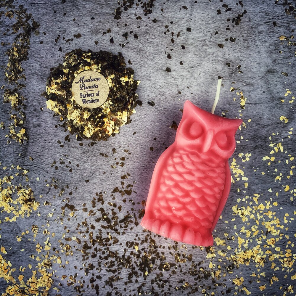 Red beeswax Wise Owl spell candle from Parlour of Wonders, featuring a detailed owl design for wisdom and psychic awareness magic.