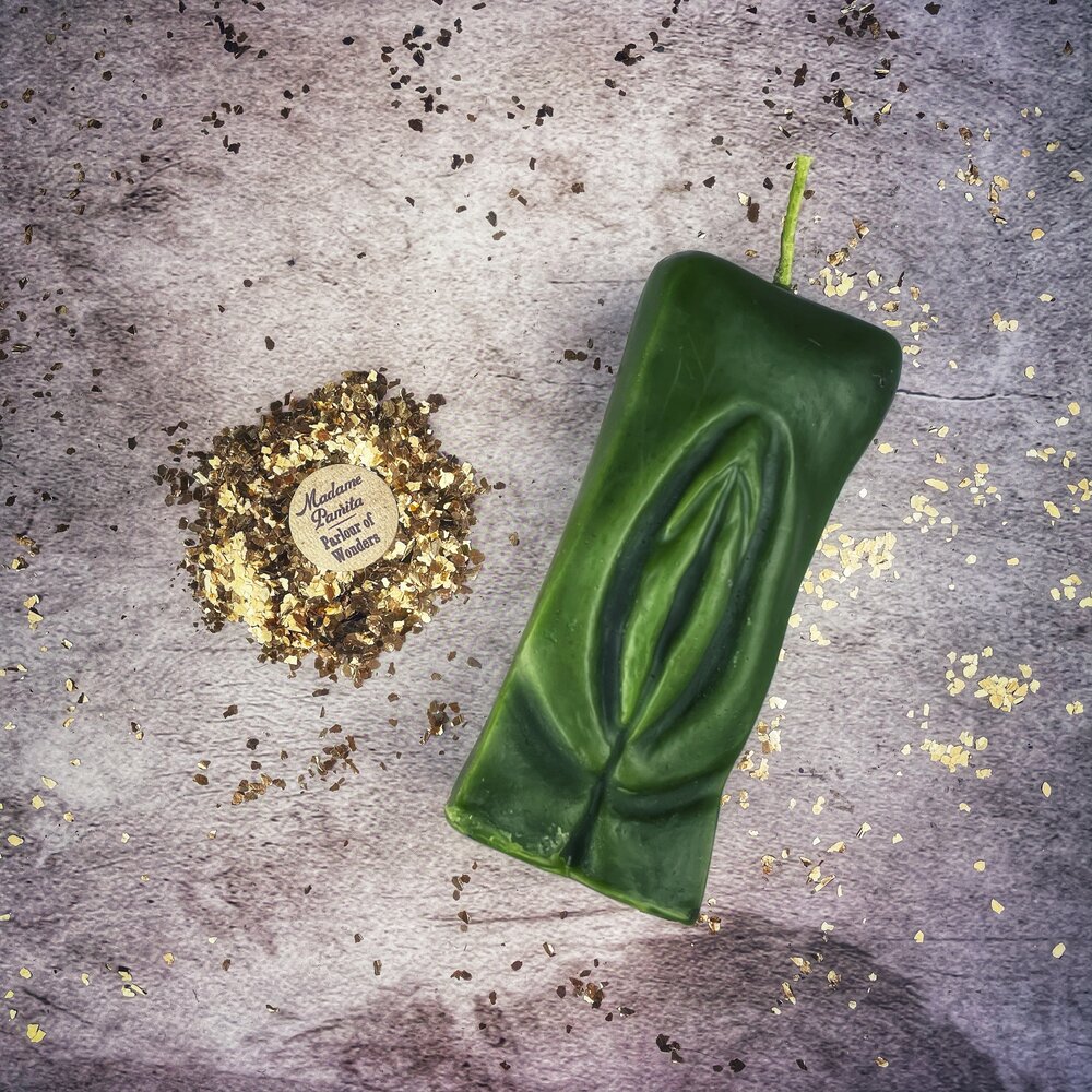 Red beeswax Yoni vulva spell candle from Parlour of Wonders for passionate love and sex magic, featuring detailed vulva design.