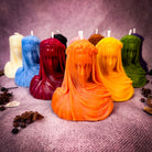 Red beeswax candle from Parlour of Wonders with a veil of secrets design, symbolizing truth, revelation, and privacy protection.