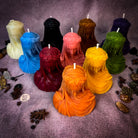 Red beeswax candle from Parlour of Wonders with intricate design, symbolizing truth revelation and privacy protection for secret relationships.