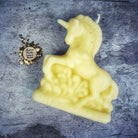 White beeswax unicorn spell candle by Parlour of Wonders, designed for manifestation, wishes, and magic.