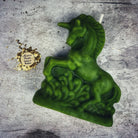 White beeswax unicorn spell candle by Parlour of Wonders for manifestation, wishes, and magic enchantment.