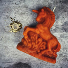 White beeswax unicorn spell candle by Parlour of Wonders, used for manifestation and wishes magic.