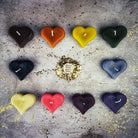 White beeswax mini heart candle from Parlour of Wonders for love influence and emotional healing magic.