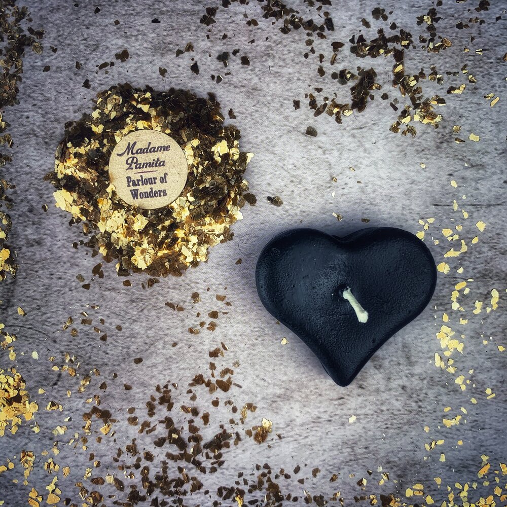 White beeswax mini heart candle by Parlour of Wonders, used for love influence and emotional healing magic.