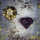 White beeswax mini heart spell candle from Parlour of Wonders, used for love influence and emotional healing magic.