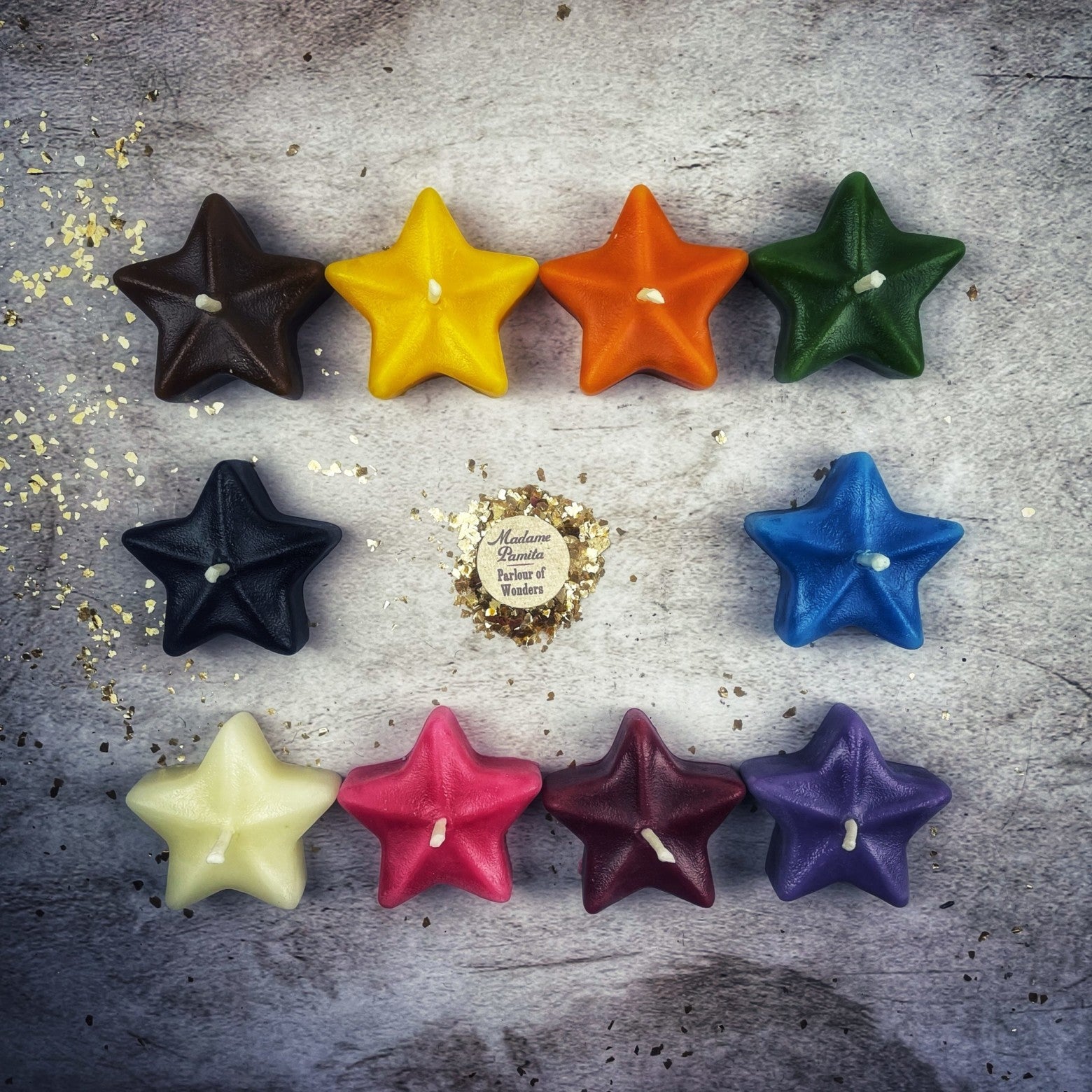 White beeswax Sister Star Spell Candle by Parlour of Wonders, featuring a star design for protection and spiritual magic.