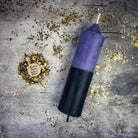 Yellow and black beeswax double action reversing spell candle by Parlour of Wonders for protection and curse reversal magic.