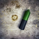Yellow and black beeswax double action reversing spell candle by Parlour of Wonders for protection and curse reversal magic.