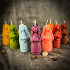 Yellow beeswax Lada Motanka spell candle by Parlour of Wonders with traditional design for blessings, love, and protection.