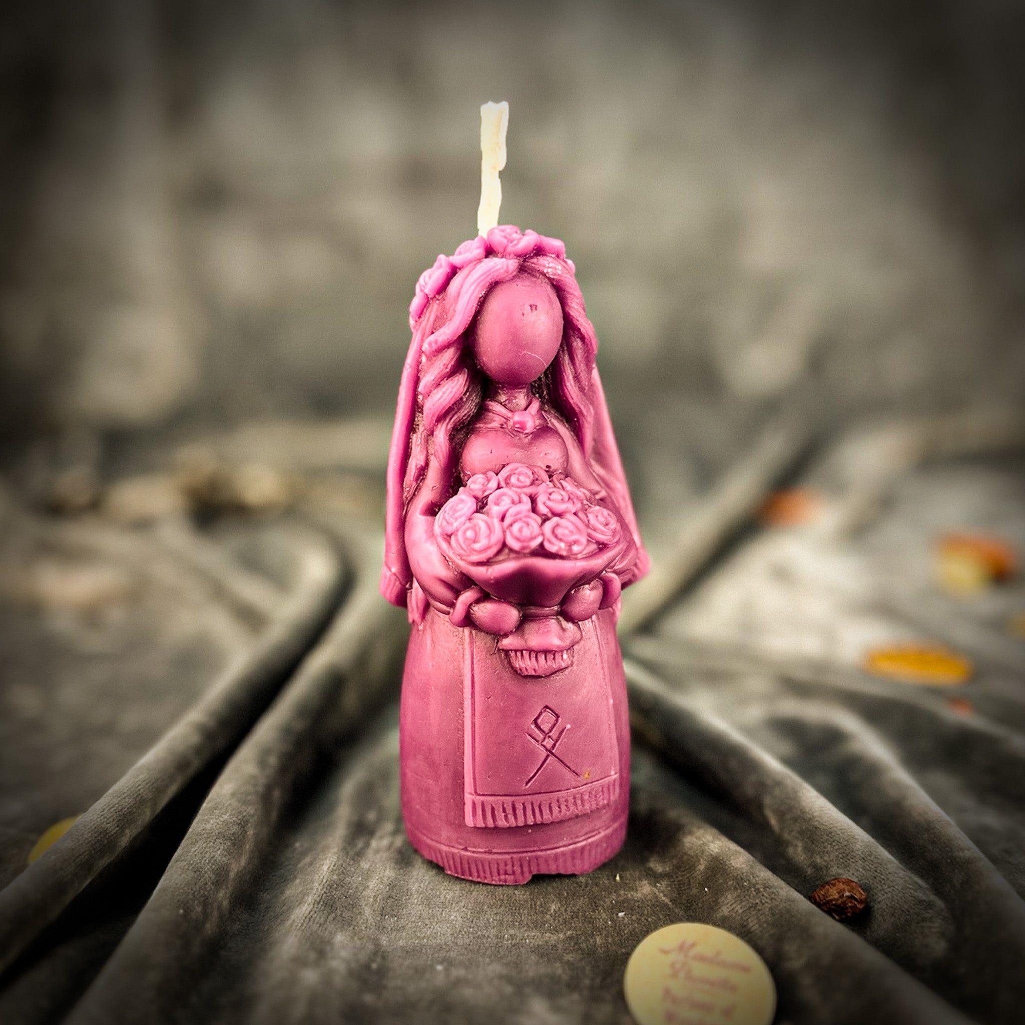 Yellow beeswax Lada Motanka spell candle from Parlour of Wonders with traditional design, symbolizing love, protection, and ancestral blessings.