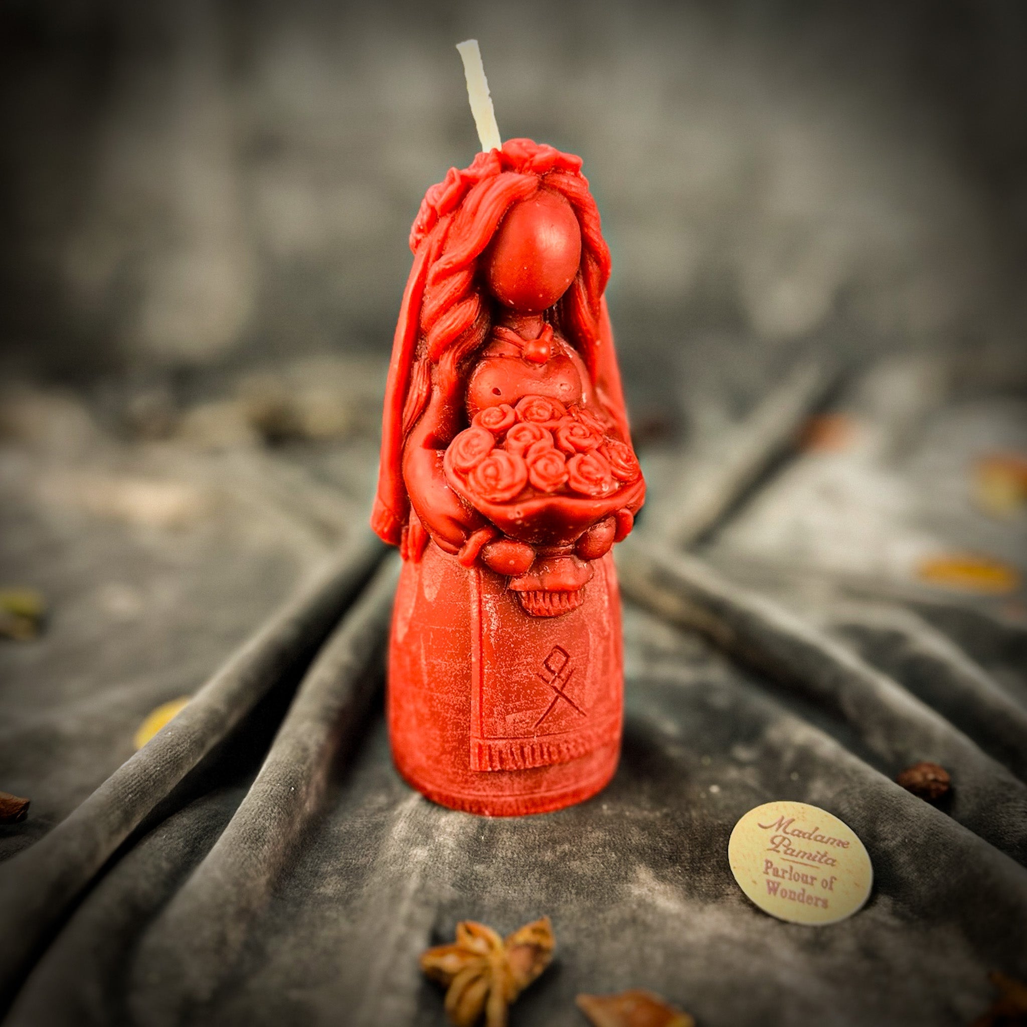 Yellow beeswax Lada Motanka spell candle by Parlour of Wonders, shaped for blessings, love, and protection.