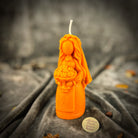 Yellow beeswax Lada Motanka spell candle from Parlour of Wonders with traditional design for blessings, love, and protection.