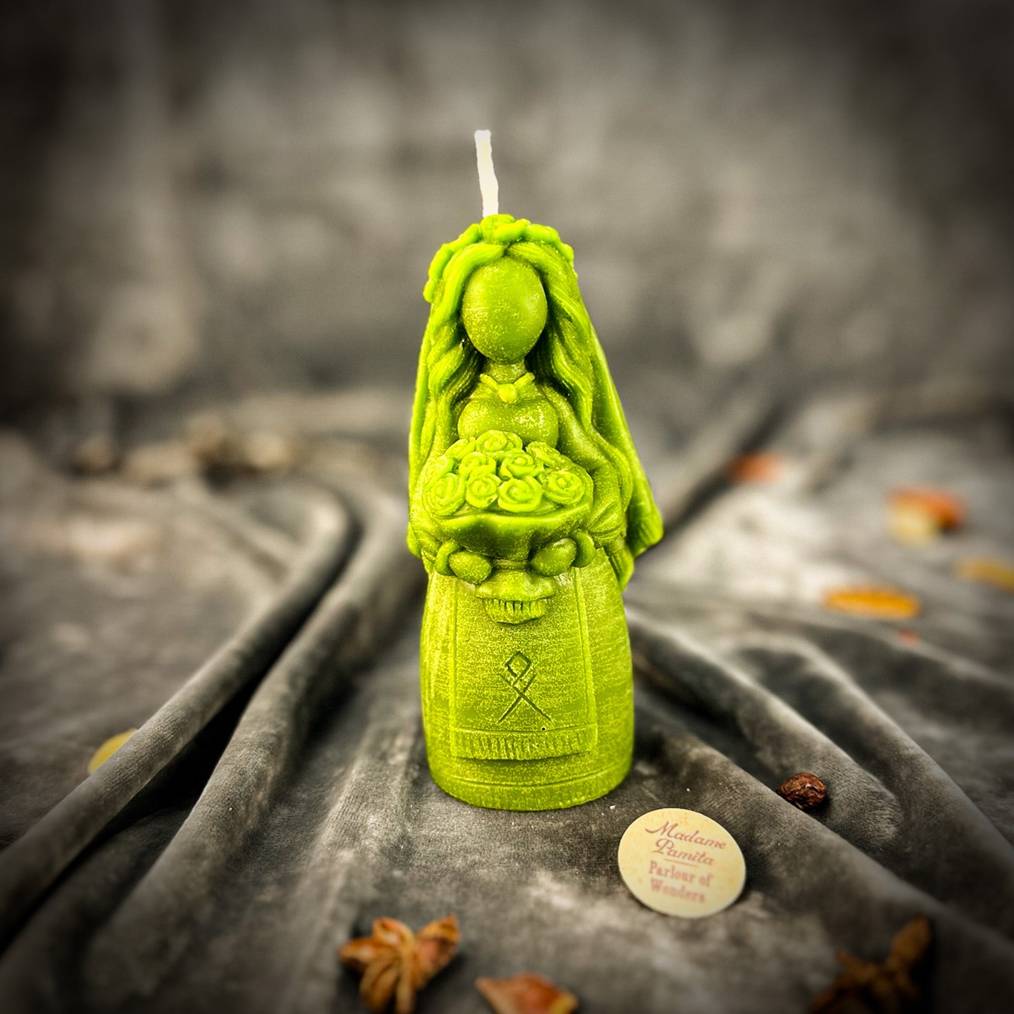 Yellow beeswax Lada Motanka spell candle by Parlour of Wonders, featuring traditional design for blessings, love, and protection.