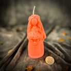 Yellow beeswax Lada Motanka spell candle by Parlour of Wonders, featuring intricate designs for love, protection, and ancestral blessings.