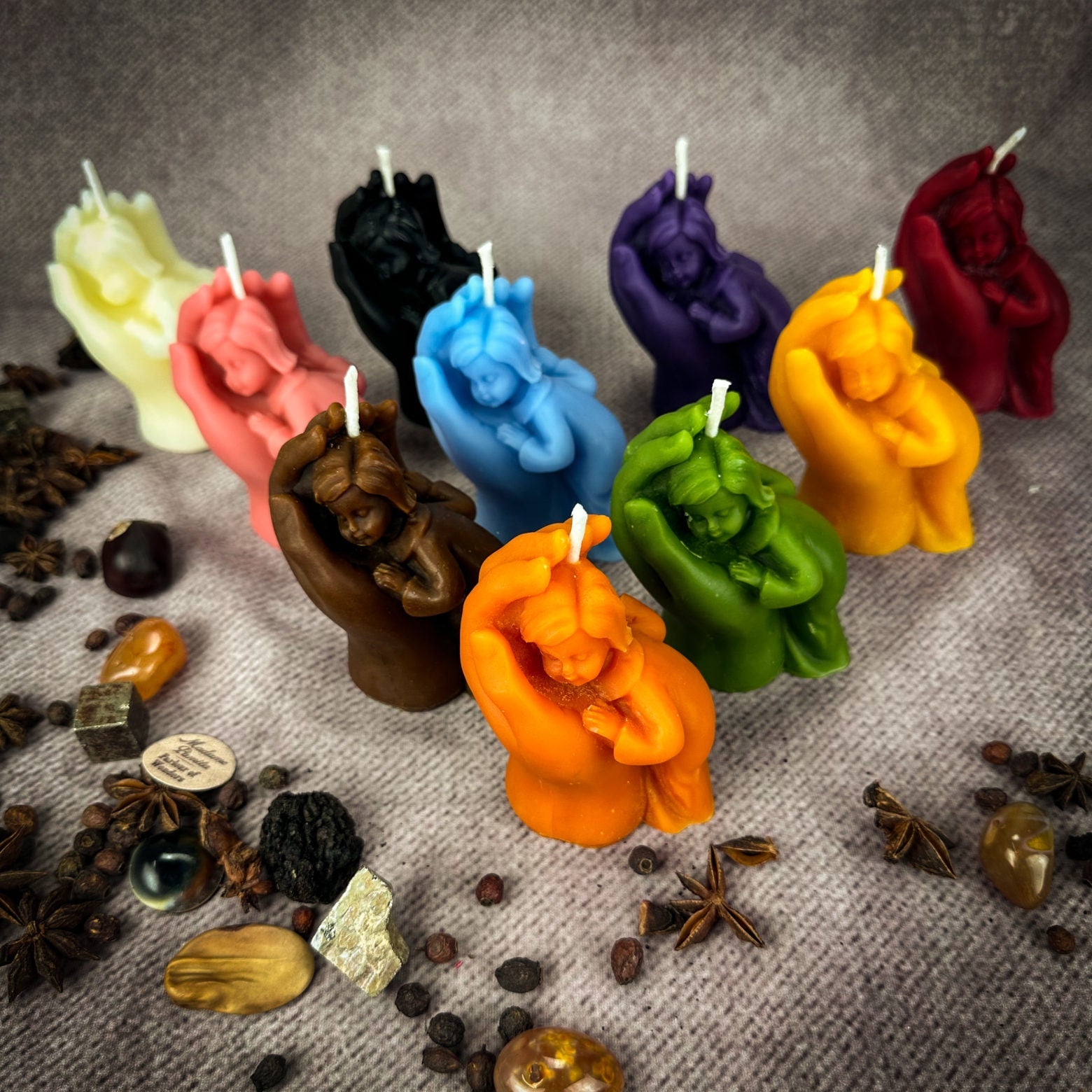 Yellow beeswax Mother and Child spell candle by Parlour of Wonders, featuring protective and fertility symbols for family blessings.