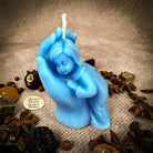 Yellow beeswax mother and child spell candle with protective and fertility symbols, crafted by Parlour of Wonders.