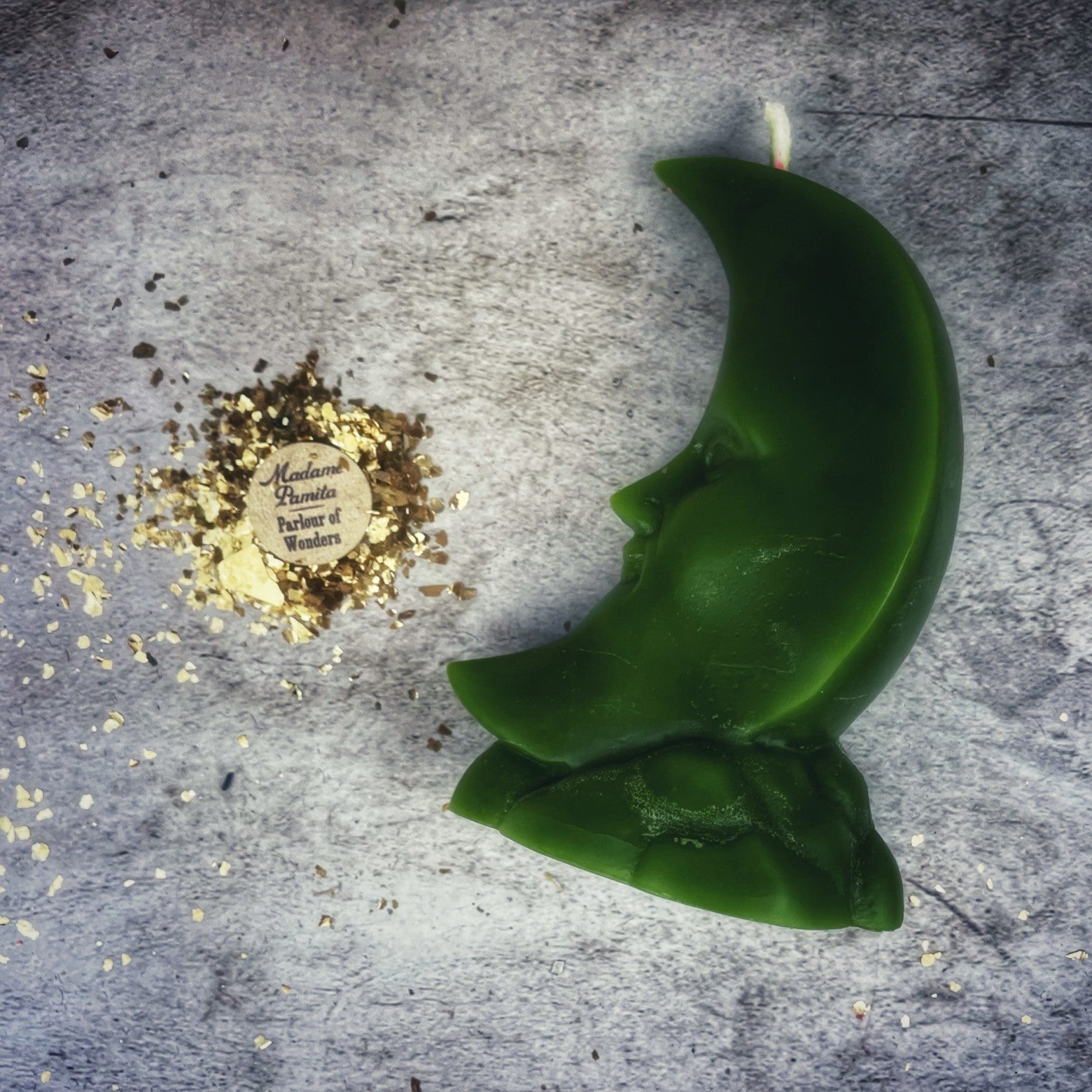 Yellow beeswax crescent moon spell candle by Parlour of Wonders, featuring lunar magic and manifestation symbols.